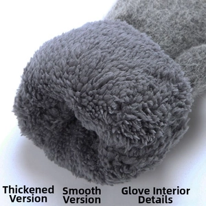Close-up of thick fleece lining inside a gray knitted glove showing warm texture