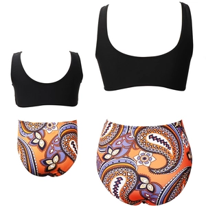 Matching mother daughter two piece swimsuits with black tops and paisley high waist bottoms
