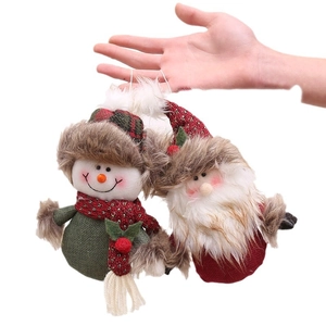 Christmas plush ornaments featuring Santa Claus and snowman with knit and fur details