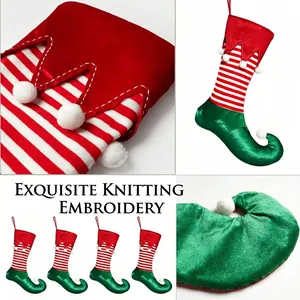 Set of four knitted elf Christmas stockings with red and white stripes and green curled toes