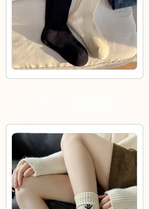 Detail of crew socks with rabbit embroidery and soft ribbed texture in neutral colors