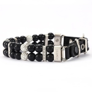 Close-up of double-row black pearl pet collar with crystal beads and D-ring buckle