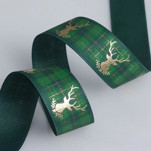 Dark green plaid Christmas ribbon with gold reindeer foil print for gift wrapping DIY