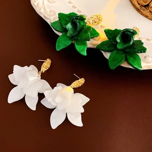 Exquisite layered flower earrings in green and white with gold textured centers