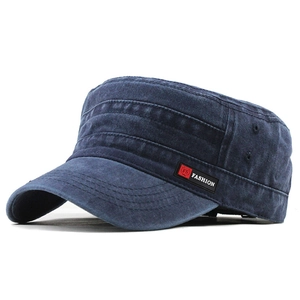 Detail view of navy blue washed cotton military cap with vintage fashion logo patch