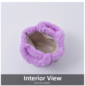 Internal view of the purple faux fur handbag showing beige lining and large capacity