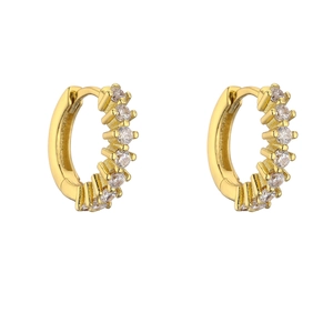 Close-up of gold-plated hoop earrings with micro-pave cubic zirconia settings