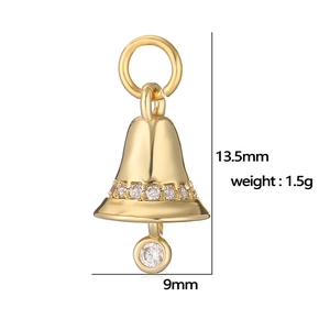 Detail view of a gold Christmas bell pendant with diamonds and precise dimensions