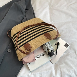 Borsa tote in paglia intrecciata a righe con manici in pelle e ampio spazio interno