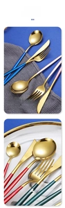 Close-up of 304 stainless steel cutlery with gold finish and colorful handles