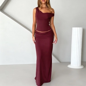 Elegant burgundy two-piece evening set with one-shoulder top and high-slit long skirt