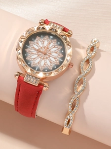 Detail of red leather watch strap with floral rhinestone dial and matching gold bracelet
