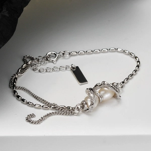 Elegant S925 silver double-layered bracelet featuring pearls and wave-shaped metal design
