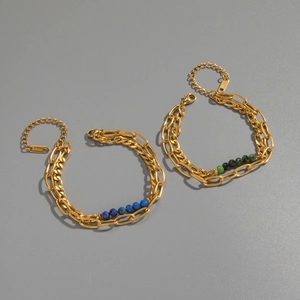 Detail of 18K gold-plated double-layer stainless steel bracelet with lapis lazuli beads