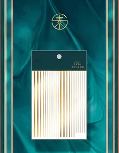 Detail of M-081 gold line nail stickers on elegant dark teal silk background