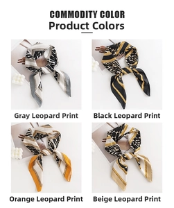 Detail showing four color options of leopard print silk scarves with chain borders