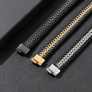 Three-piece set of woven stainless steel chain bracelets in black, gold, and silver finishes