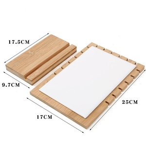 Bamboo and wood jewelry display stand with white padded backboard for necklace showing