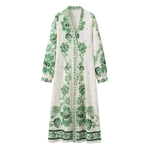 Floral print long dress with V-neck and lantern sleeves in white and green vacation style