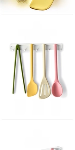 Close-up of heat-resistant silicone kitchen tools with magnetic storage feature