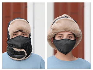 Close-up of winter trapper hat set with thick fleece lining and windproof face mask