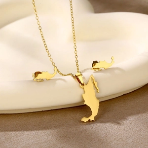 Polished gold jewelry set with Mexico map pendants on elegant curved display stand