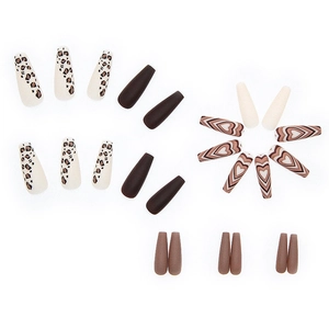 Coffin shaped fake nails set with leopard print and heart patterns in brown tones