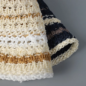 Detailed macro view of the striped knit texture on a breathable summer bucket hat