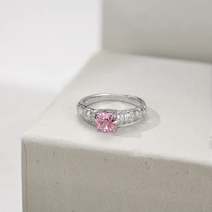 Close-up of S925 sterling silver ring featuring a pink ice-cut stone and hallmark
