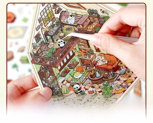 Macro detail of DIY house scene PET stickers with animals and furniture layout