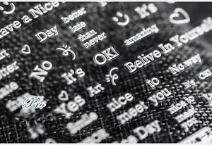 Detail of 3D embossed transparent nail stickers with inspirational quotes and heart patterns