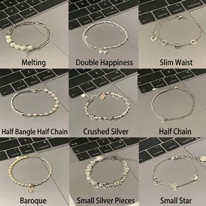 Set of 9 Korean style pearl and silver bead bracelets with various charm designs for women
