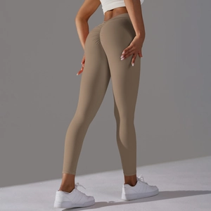 Detail showing high-waisted scrunch butt design on khaki yoga leggings for fitness