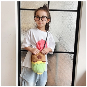 Girl wearing a cute plush bear and avocado crossbody bag with soft textures