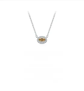 Macro shot of oval champagne moissanite pendant with S925 sterling silver chain