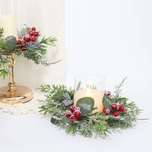 Mini Christmas candle ring wreath with eucalyptus leaves, red berries and snow dusting