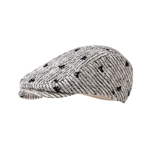 Classic tweed newsboy cap for women with black bow pattern and elegant retro design