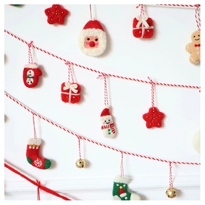 Festive wool felt Christmas ornaments featuring Santa, gingerbread man and bells
