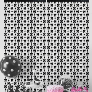 Chic black and white bow pattern fringe curtain for party backdrop with balloons