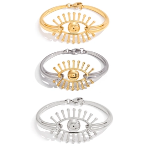 Bracelet œil maléfique en acier titane doré et argenté avec design de cils élégant