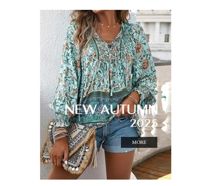 Detail of bohemian long sleeve floral print shirt with V-neck tie and elastic cuffs