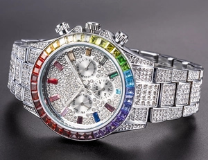 Macro detail of luxury watch featuring rainbow gemstone bezel and full diamond strap finish