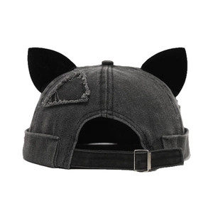 Vintage feline ear denim docker hat in grey with distressed patches and adjustable strap