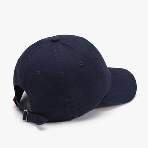 Dark blue washed cotton baseball cap with adjustable metal buckle and top embroidery detail
