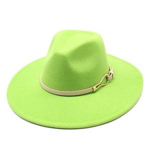 Close-up of lime green wool fedora with cream leather band and gold buckle detail