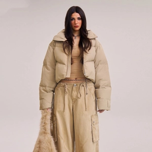 Short khaki puffer jacket with high collar and quilted waterproof fabric for winter warmth
