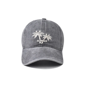 Detailed close-up of white palm tree and SUMMER embroidery on grey washed cotton cap