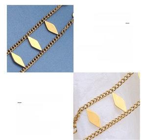 Detail of 18K gold plated titanium steel double layer bracelet with rhombus pendants