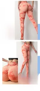 Close-up of peach tie-dye yoga leggings featuring high waist and scrunch butt detail