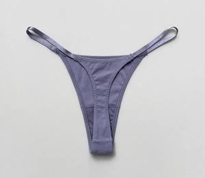 Detail of purple cotton ribbed thong featuring contrast straps and breathable fabric